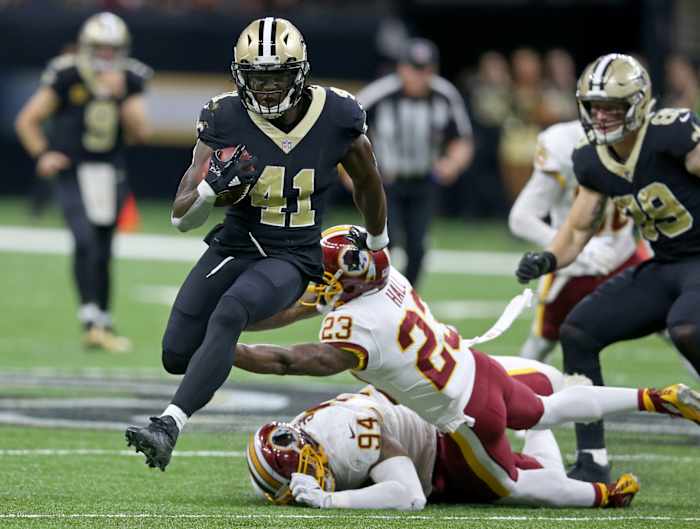Nov 19, 2017; New Orleans Saints running back Alvin Kamara (41) runs from the Washington Redskins defense. Mandatory Credit: Chuck Cook-USA TODAY Sports